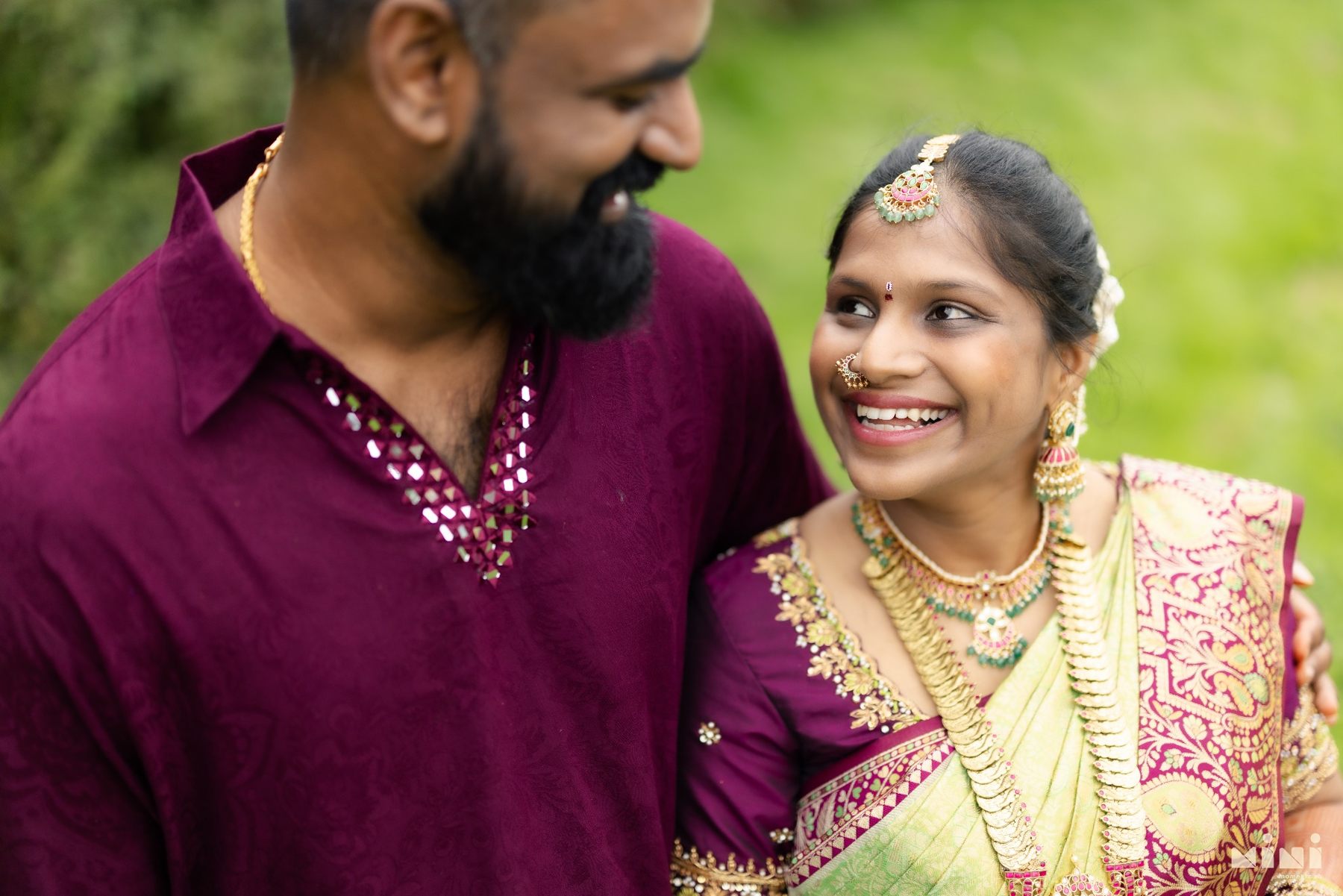 Divya and Ravi sharing an affectionate glance before their Seemantham celebration