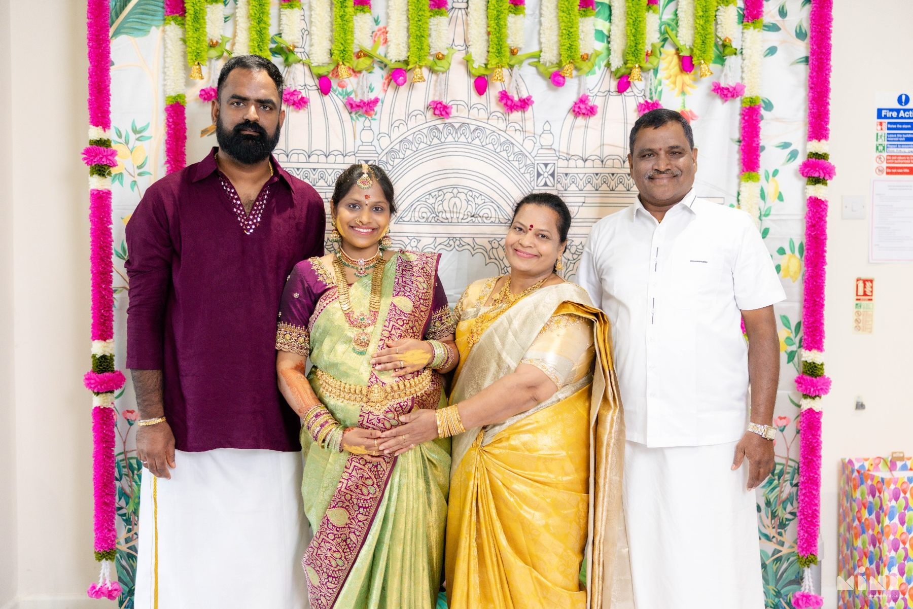 Divya with Ravi and her parents during their family celebration