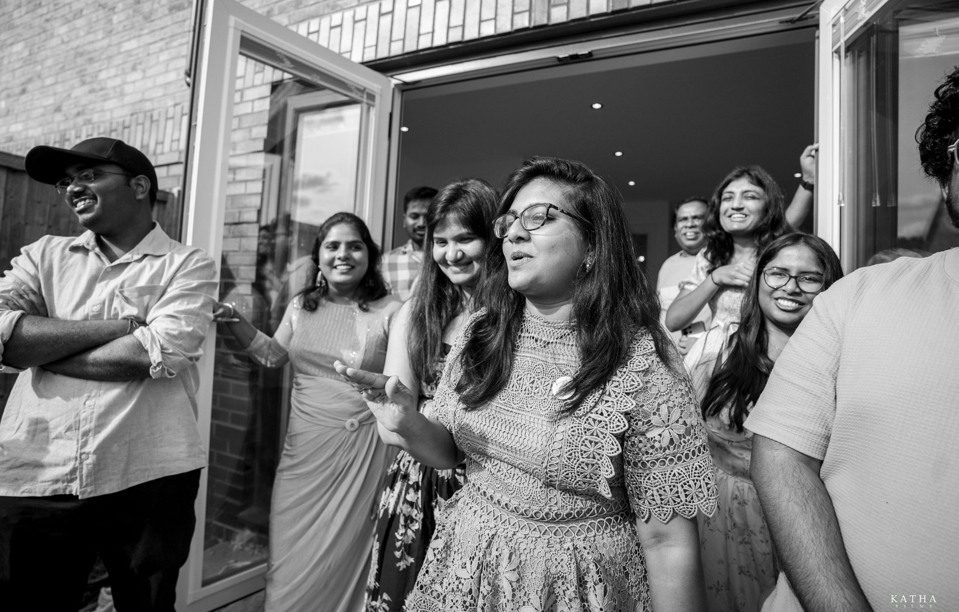 Friends cheering at the gathering — Mini Momentz