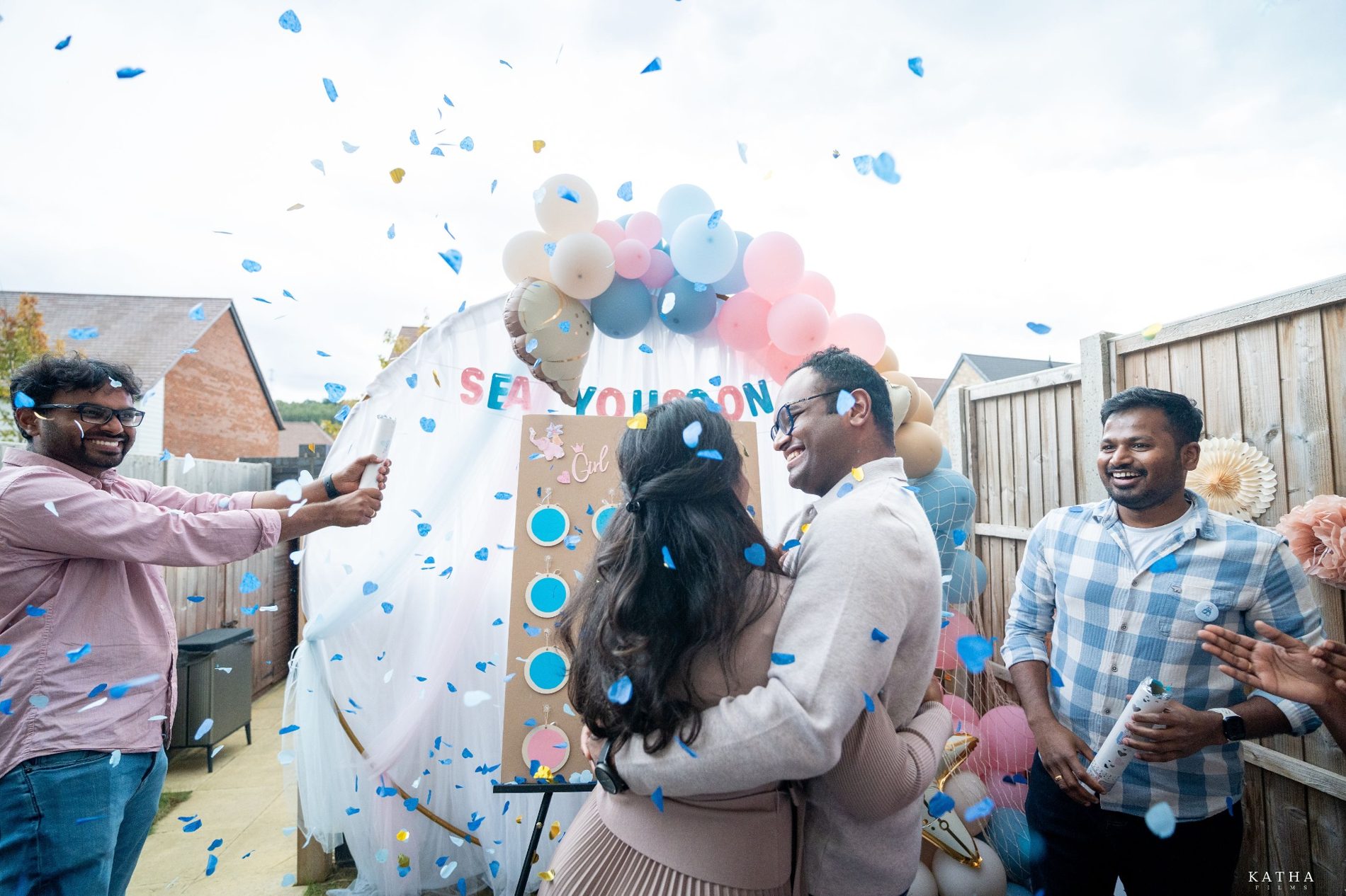 Blue confetti surrounds the couple — Mini Momentz, Kent family photography