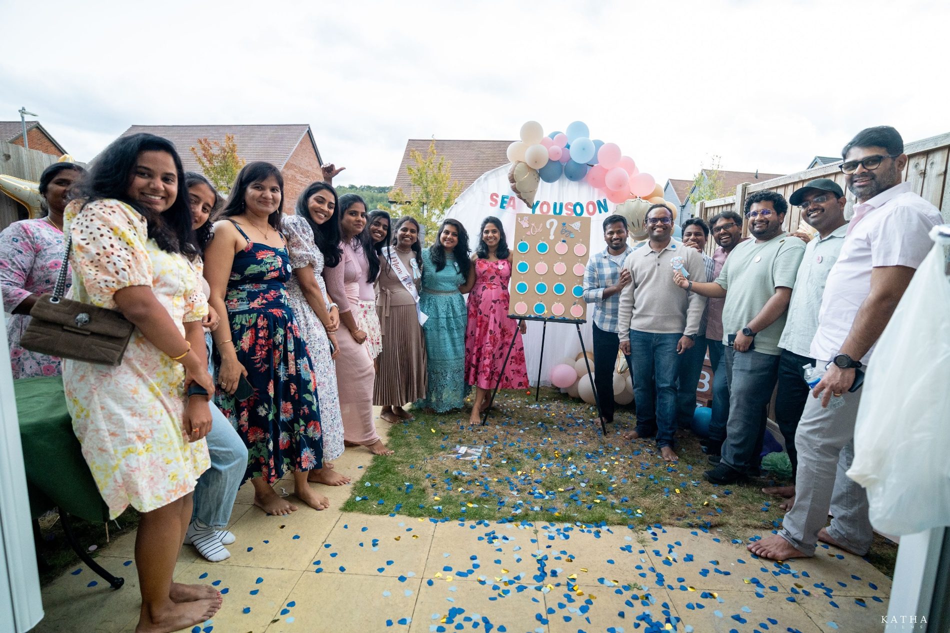 Friends pose together after the reveal — Mini Momentz