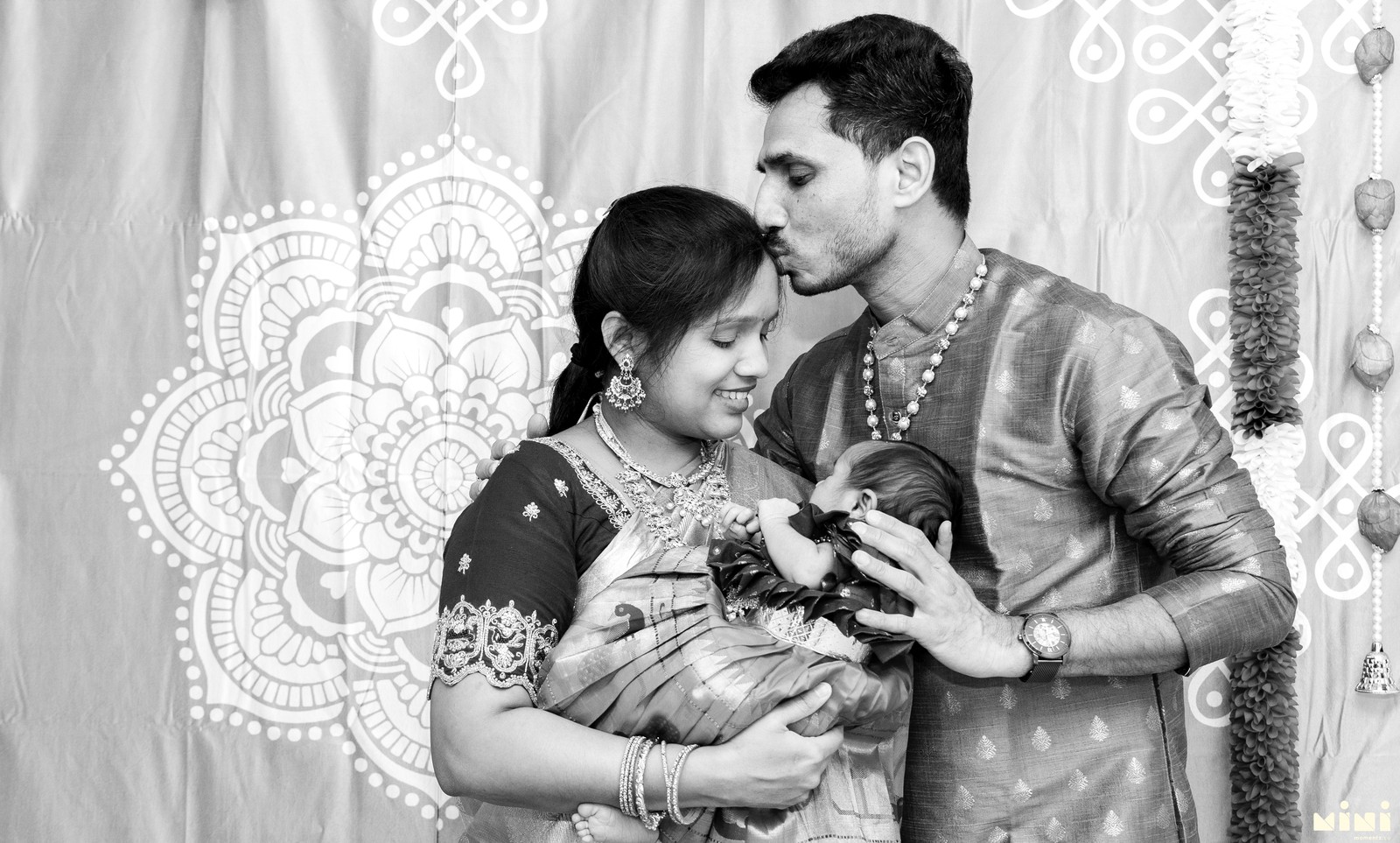 Black and white parents with newborn at ceremony — South Indian photographer MiniMomentz UK
